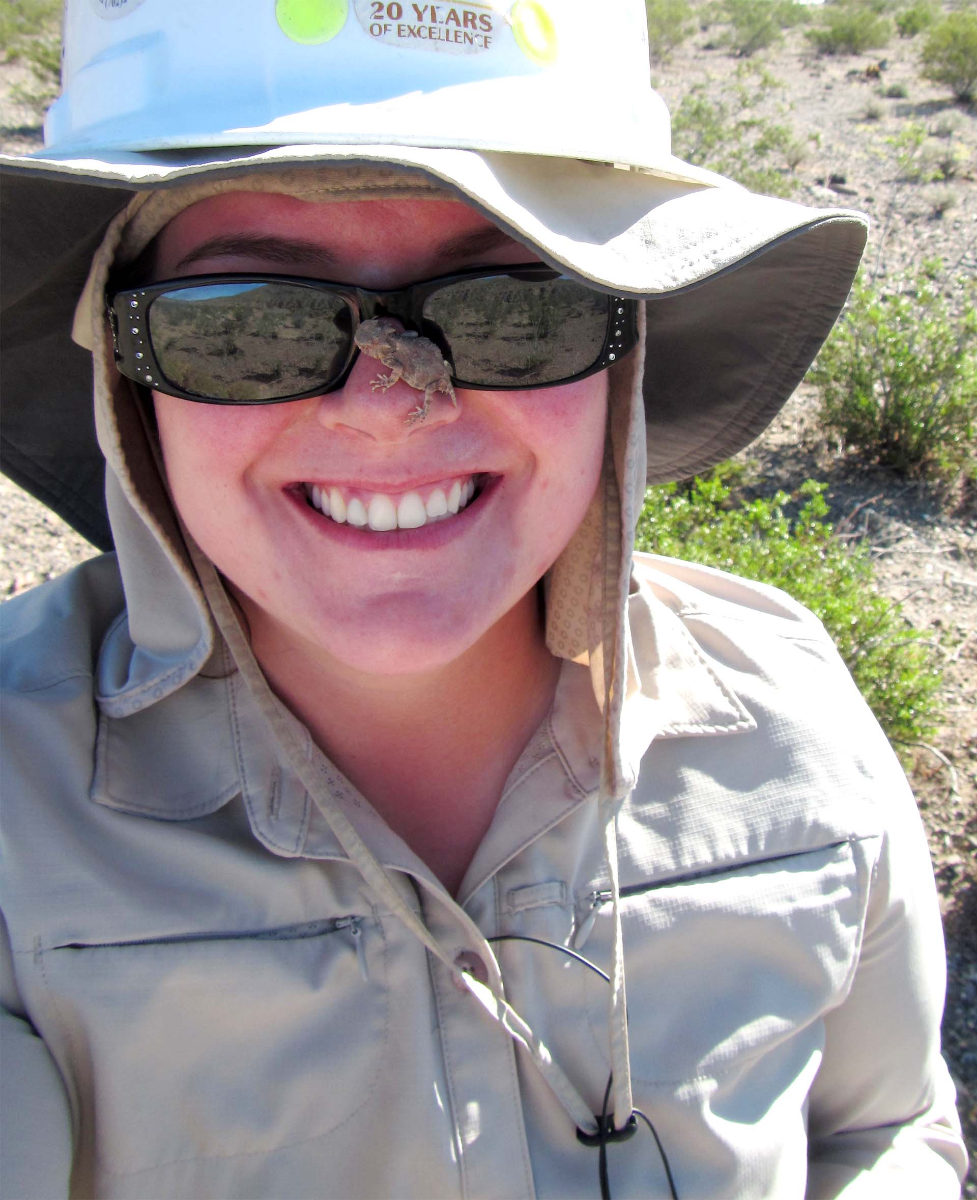 Sarah with a lizard on her face